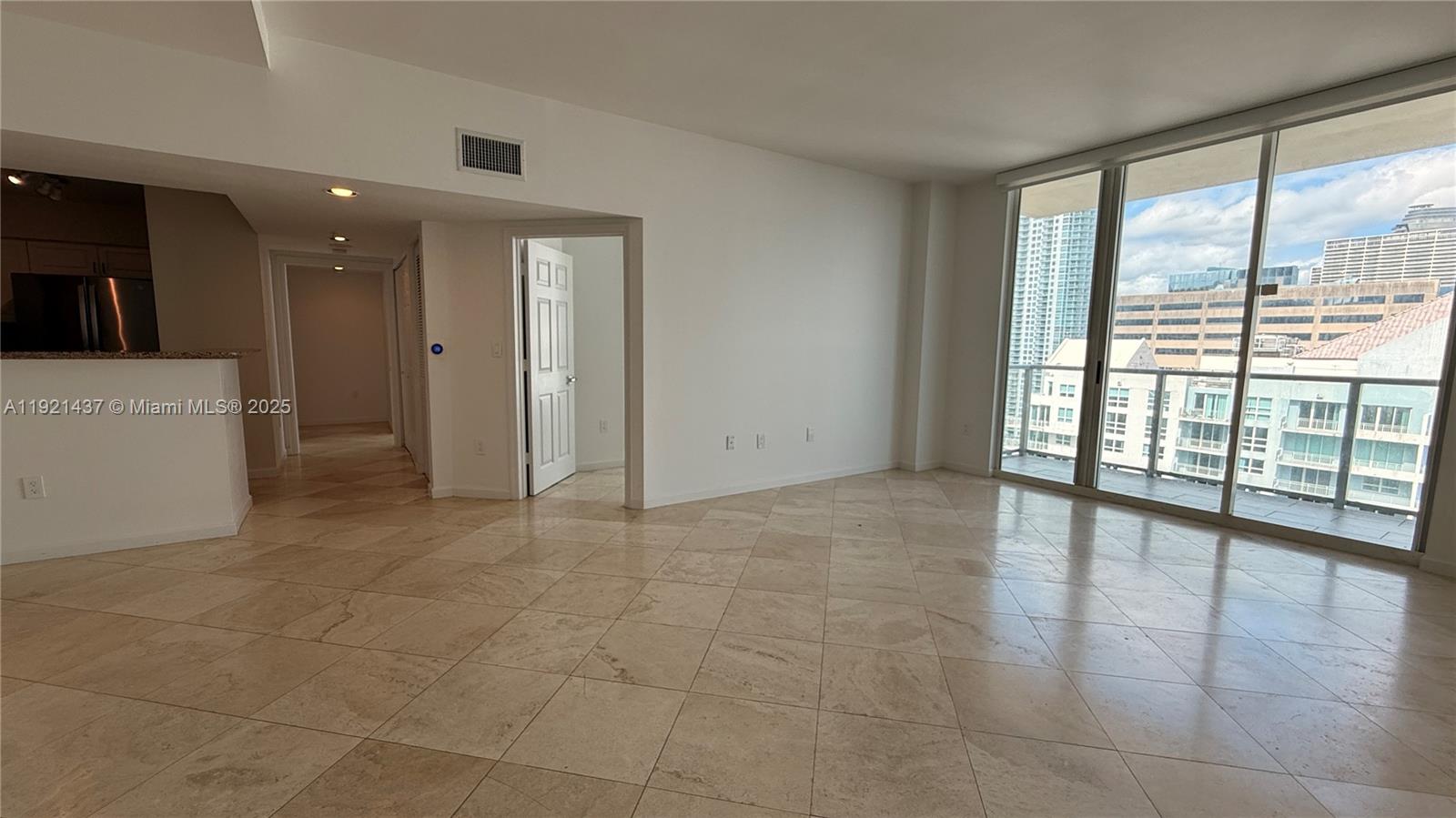 1155 Brickell Bay Drive, Unit PH104 Miami, FL 33131 - Photo 3 of 35 a view of an empty room with a window