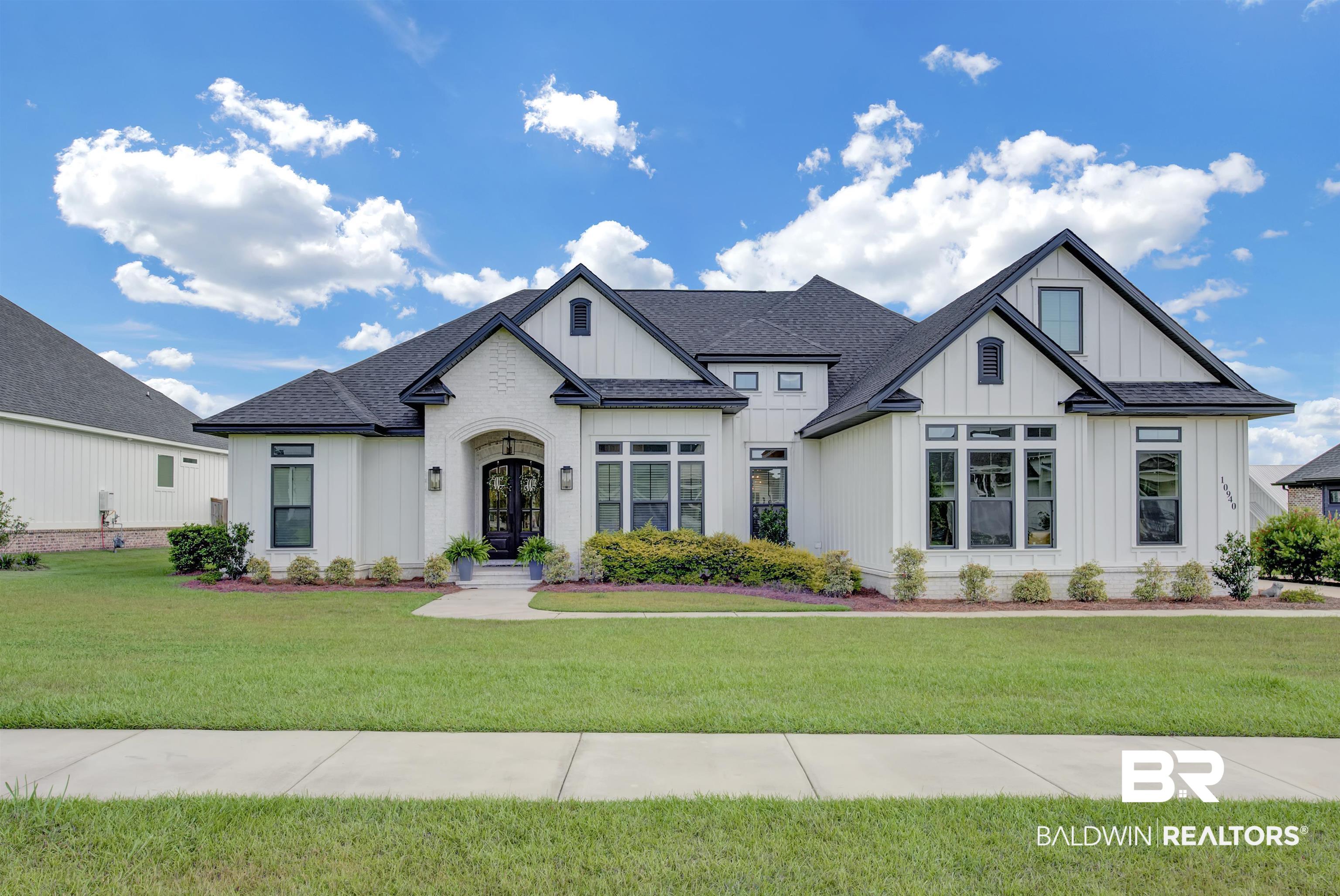 10940 Atrium Avenue Fairhope, AL 36532 - Photo 1 of 43 View of front facade featuring french doors and a front yard