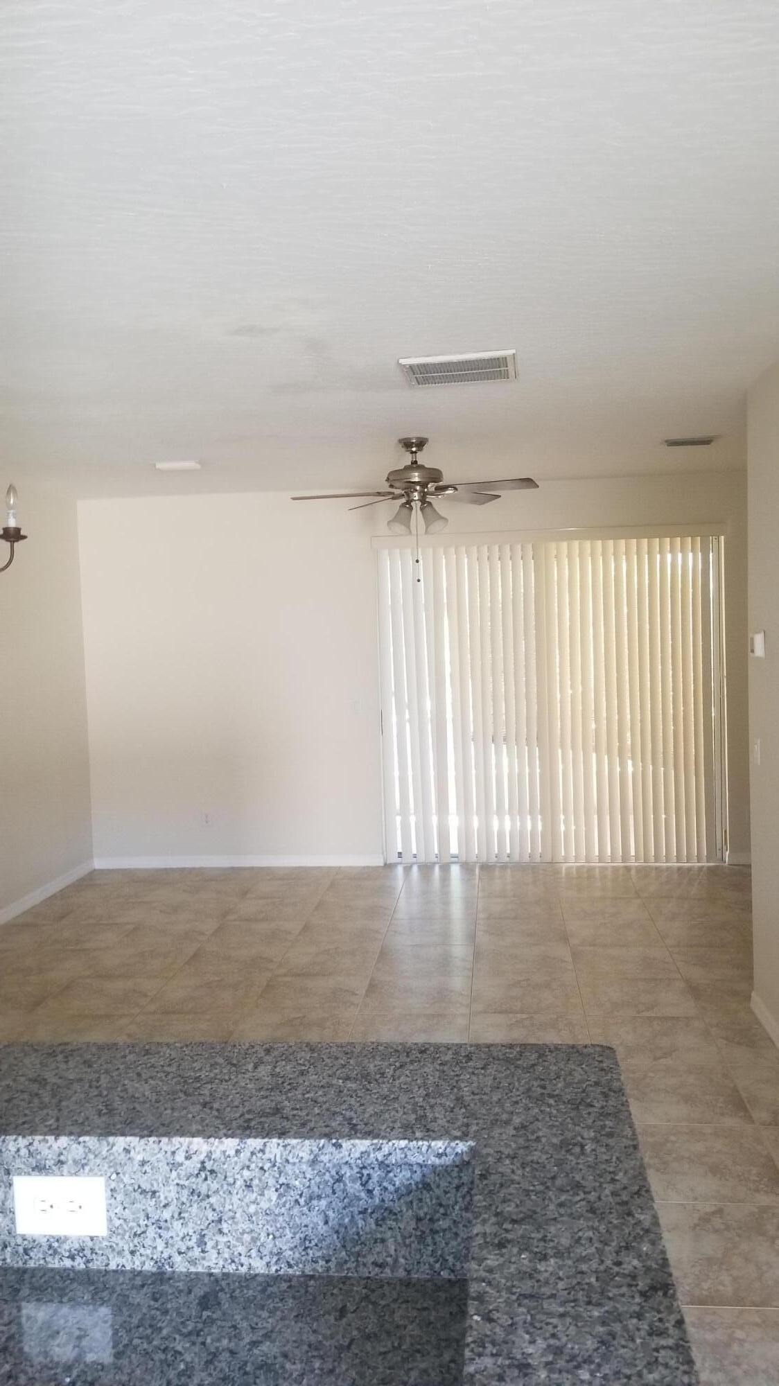 85 Pinafore Place Indialantic, FL 32903 - Photo 6 of 13 a view of an empty room and window