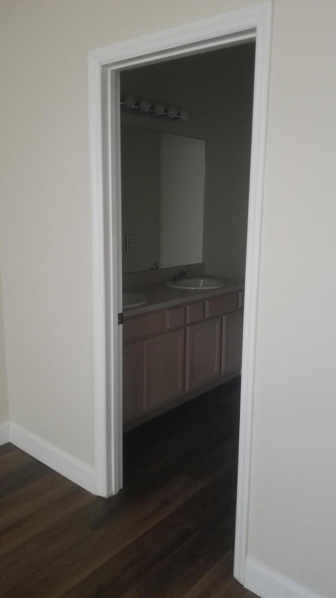 85 Pinafore Place Indialantic, FL 32903 - Photo 9 of 13 a view of hallway with wooden floor