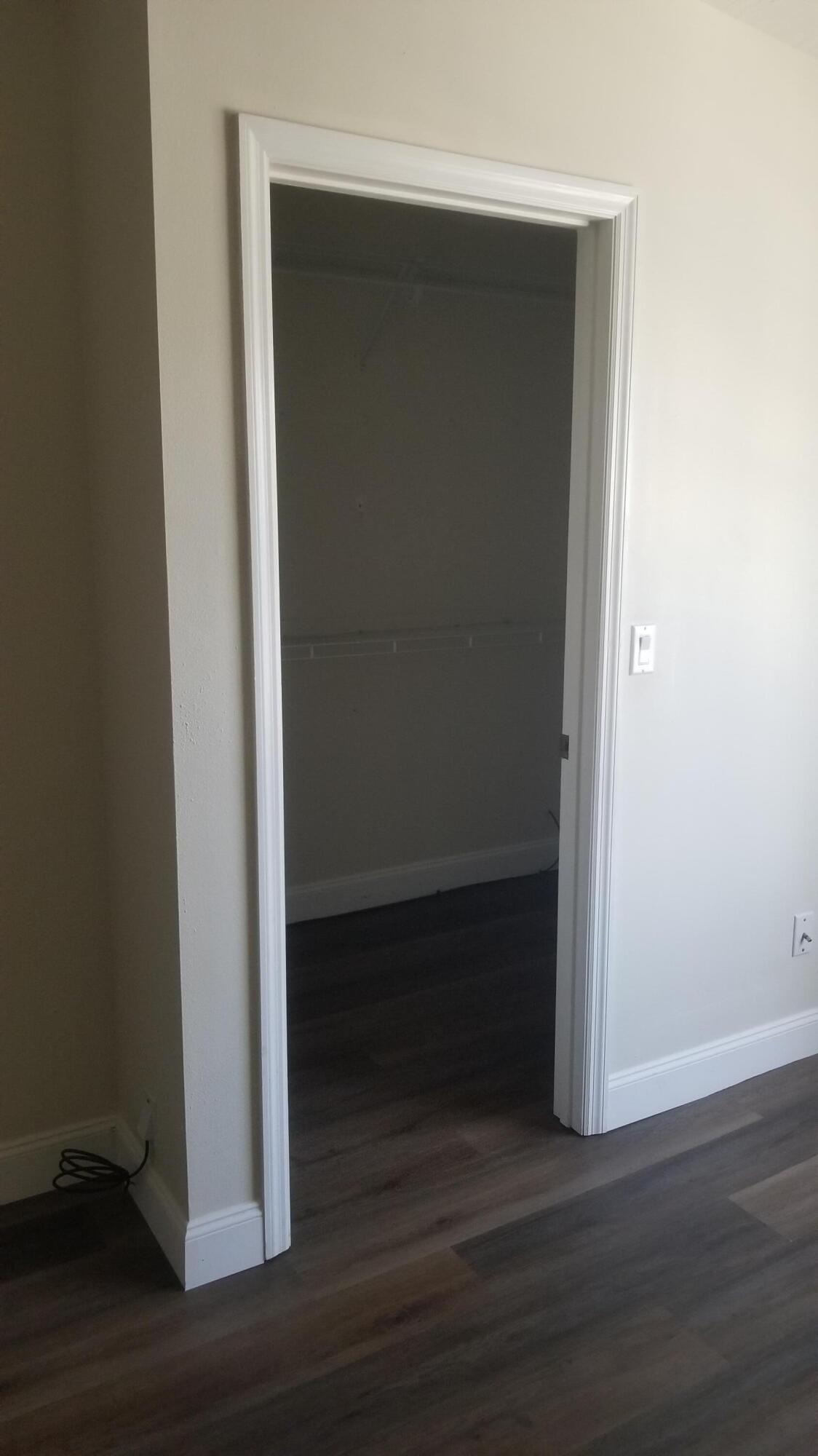 85 Pinafore Place Indialantic, FL 32903 - Photo 10 of 13 an empty room with wooden floor and closet