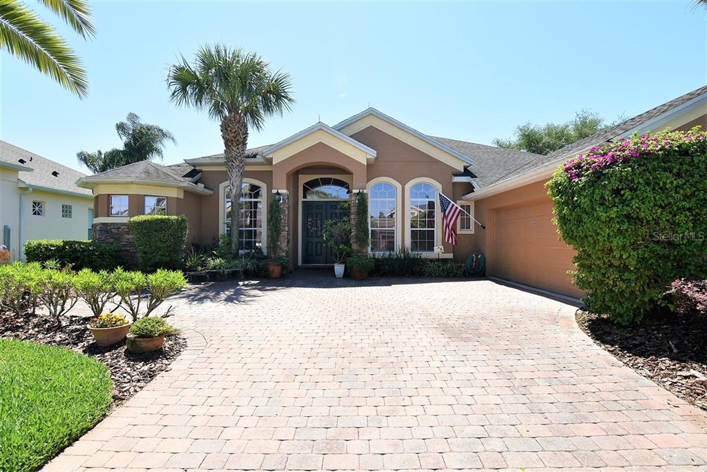 3500 Rose Mallow Loop Oviedo, FL 32766 - Photo 1 of 1 a front view of a house with a yard