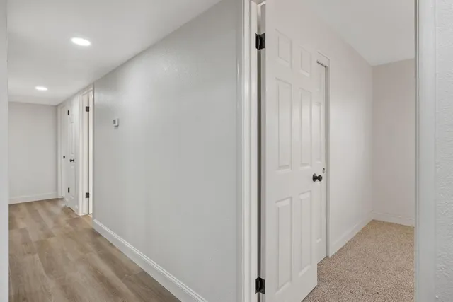 a view of hallway with shower