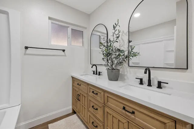 a close view of sink and a mirror
