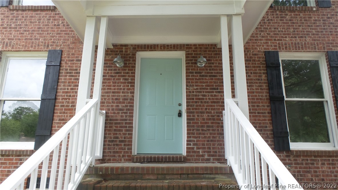 5574 Lockridge Road Fayetteville, NC 28311 - Photo 3 of 29 a view of a balcony with stairs