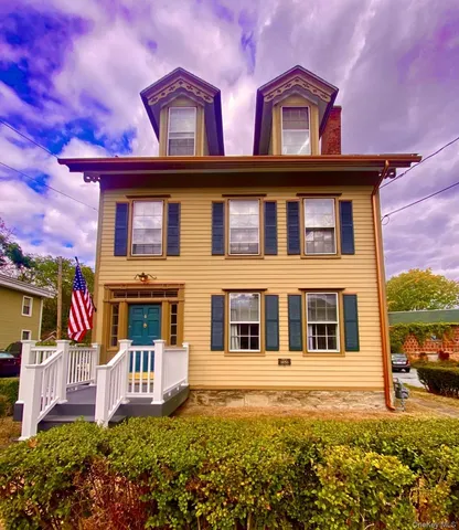 a house view with a garden space