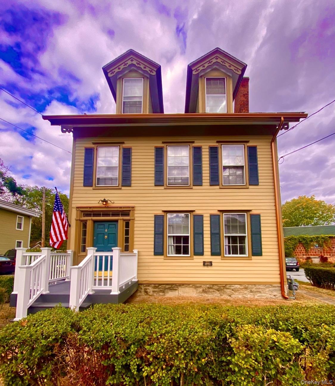 a house view with a garden space