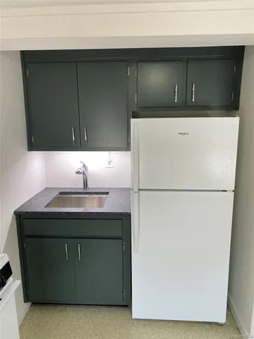a utility room with washer and dryer