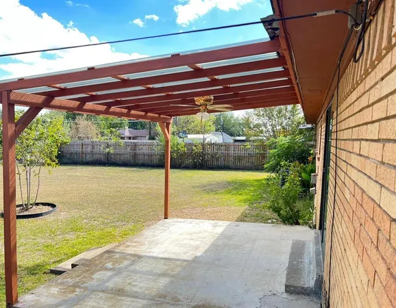 a view of a swimming pool with a porch