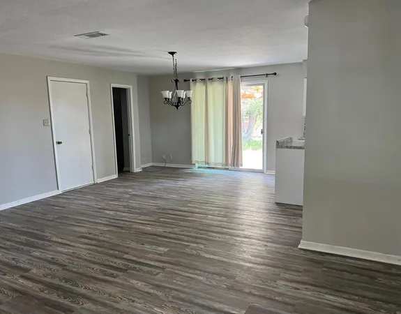 a view of livingroom with hardwood floor and window