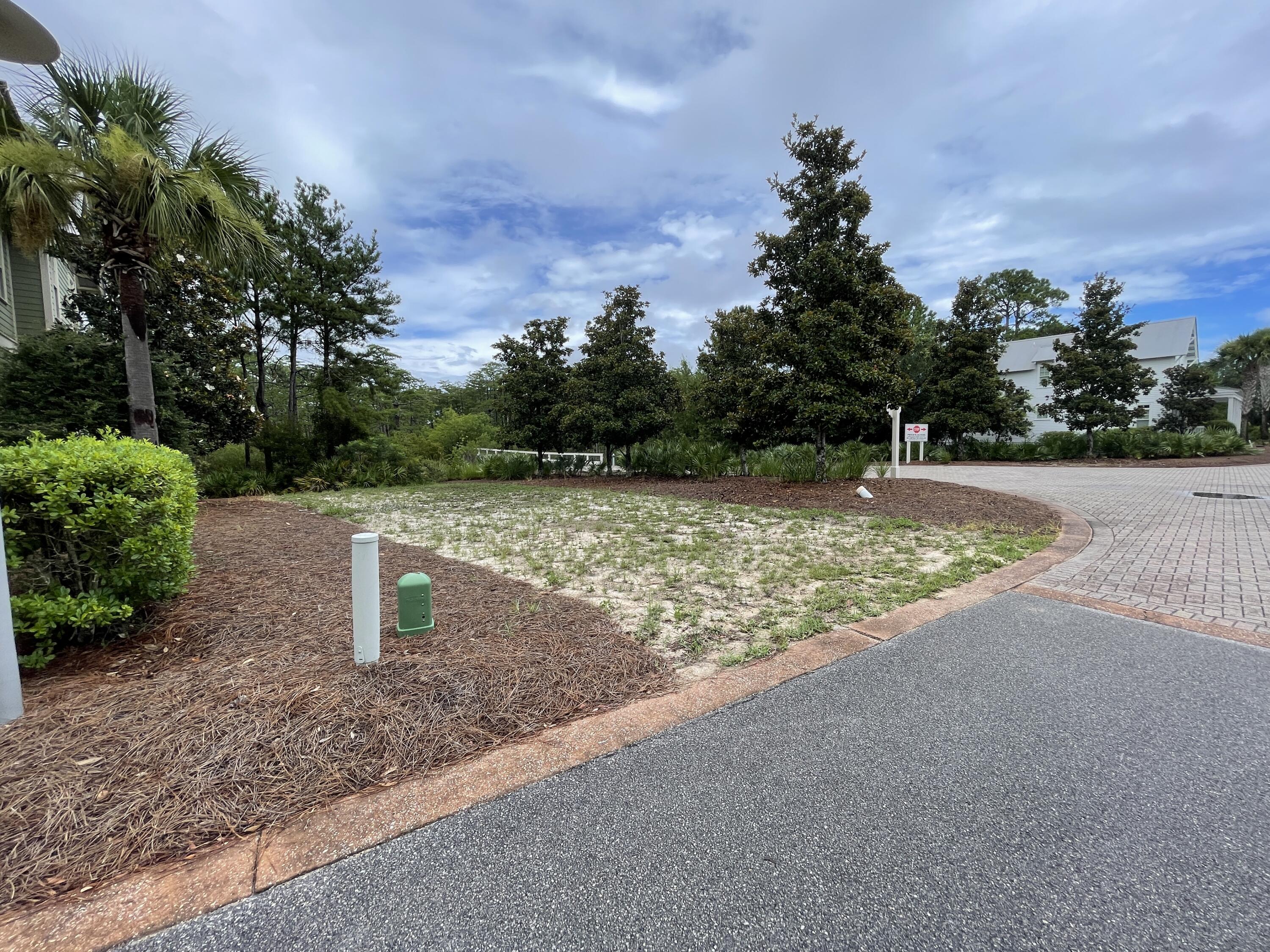 Lot 108 Cypress Walk Santa Rosa Beach, FL 32459 - Photo 12 of 17 a view of a water fountain with a tree in the background