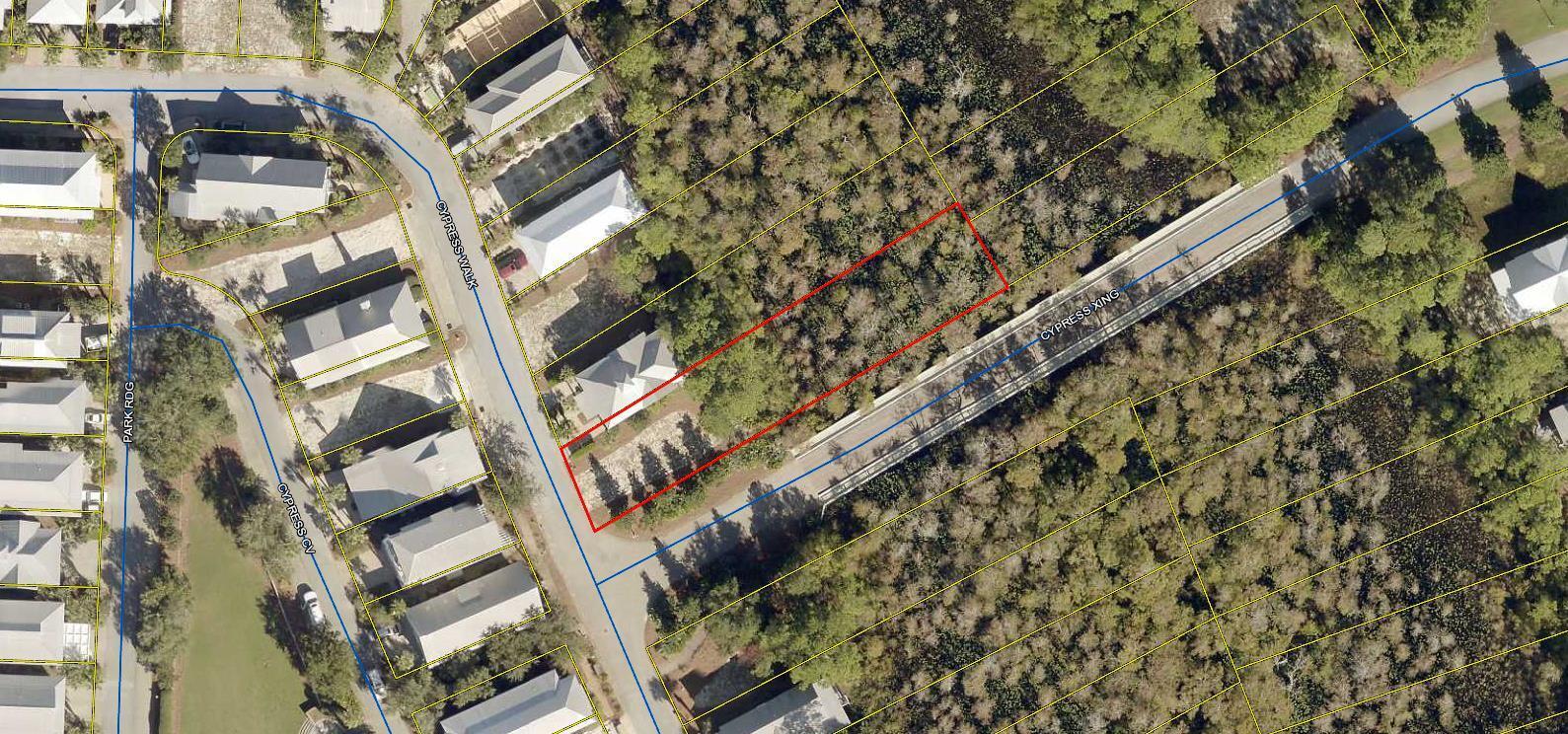 Lot 108 Cypress Walk Santa Rosa Beach, FL 32459 - Photo 17 of 17 a tall building with a trees in front of it
