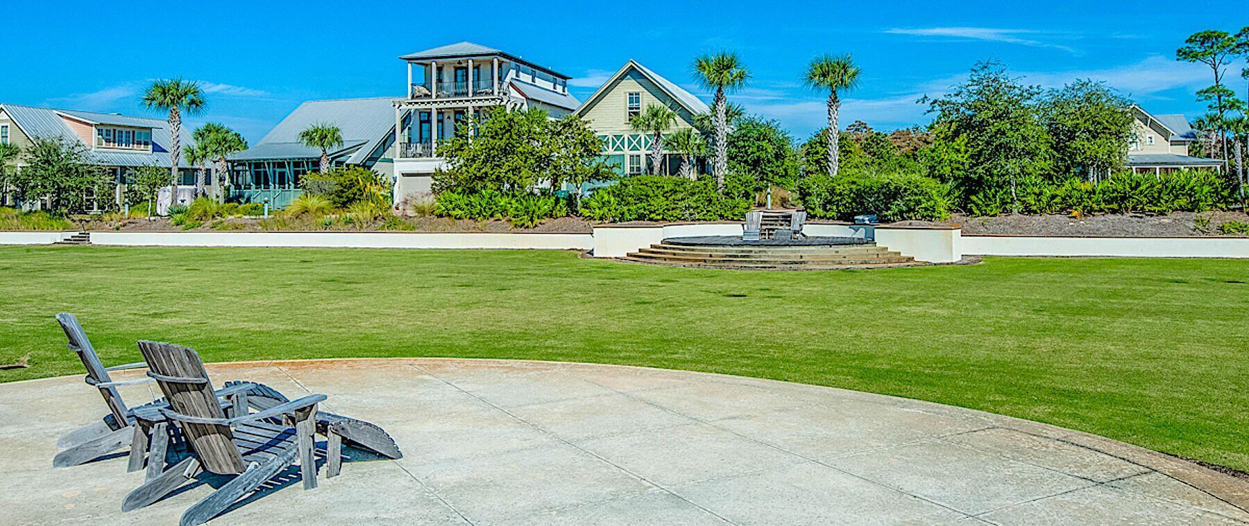 Lot 108 Cypress Walk Santa Rosa Beach, FL 32459 - Photo 6 of 17 a front view of a house with garden