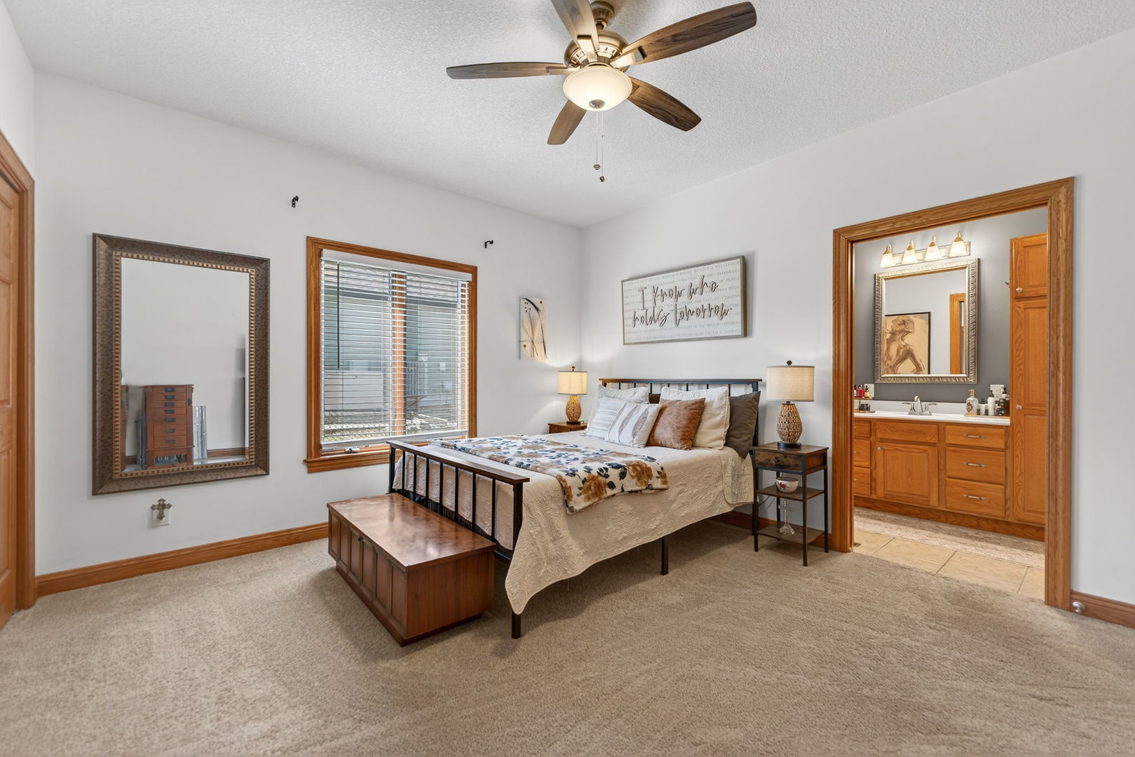 124 5th Street Fulton, IL 61252 - Photo 13 of 45 a spacious bedroom with a bed couch and a window