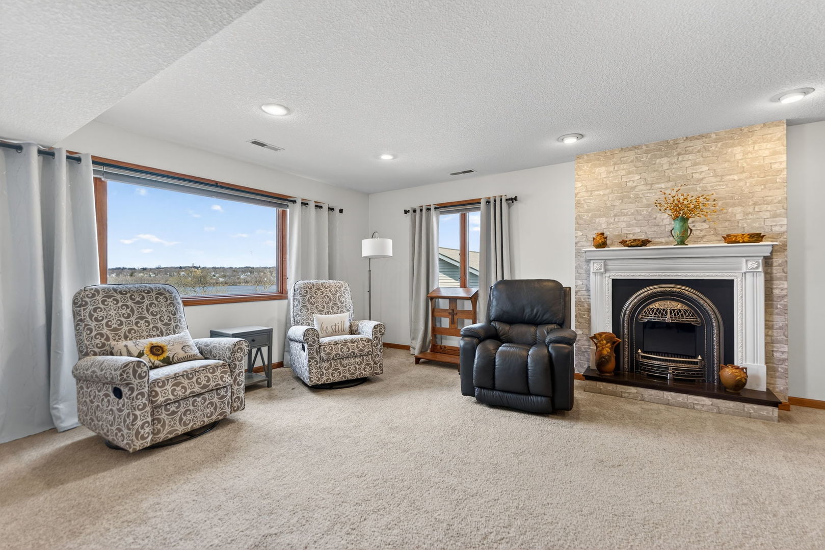 124 5th Street Fulton, IL 61252 - Photo 21 of 45 a living room with furniture and a fireplace