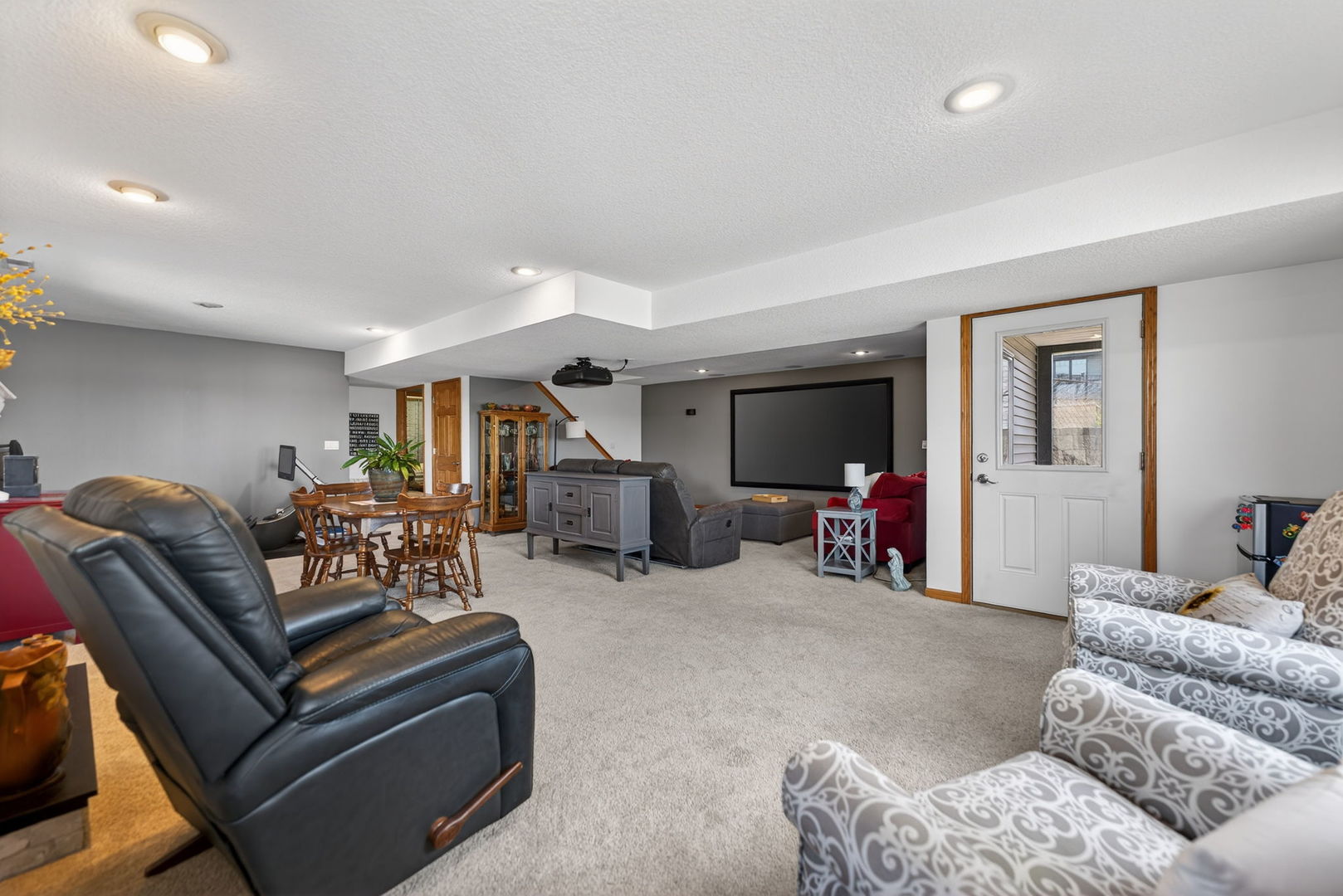 124 5th Street Fulton, IL 61252 - Photo 22 of 45 a living room with furniture and a flat screen tv