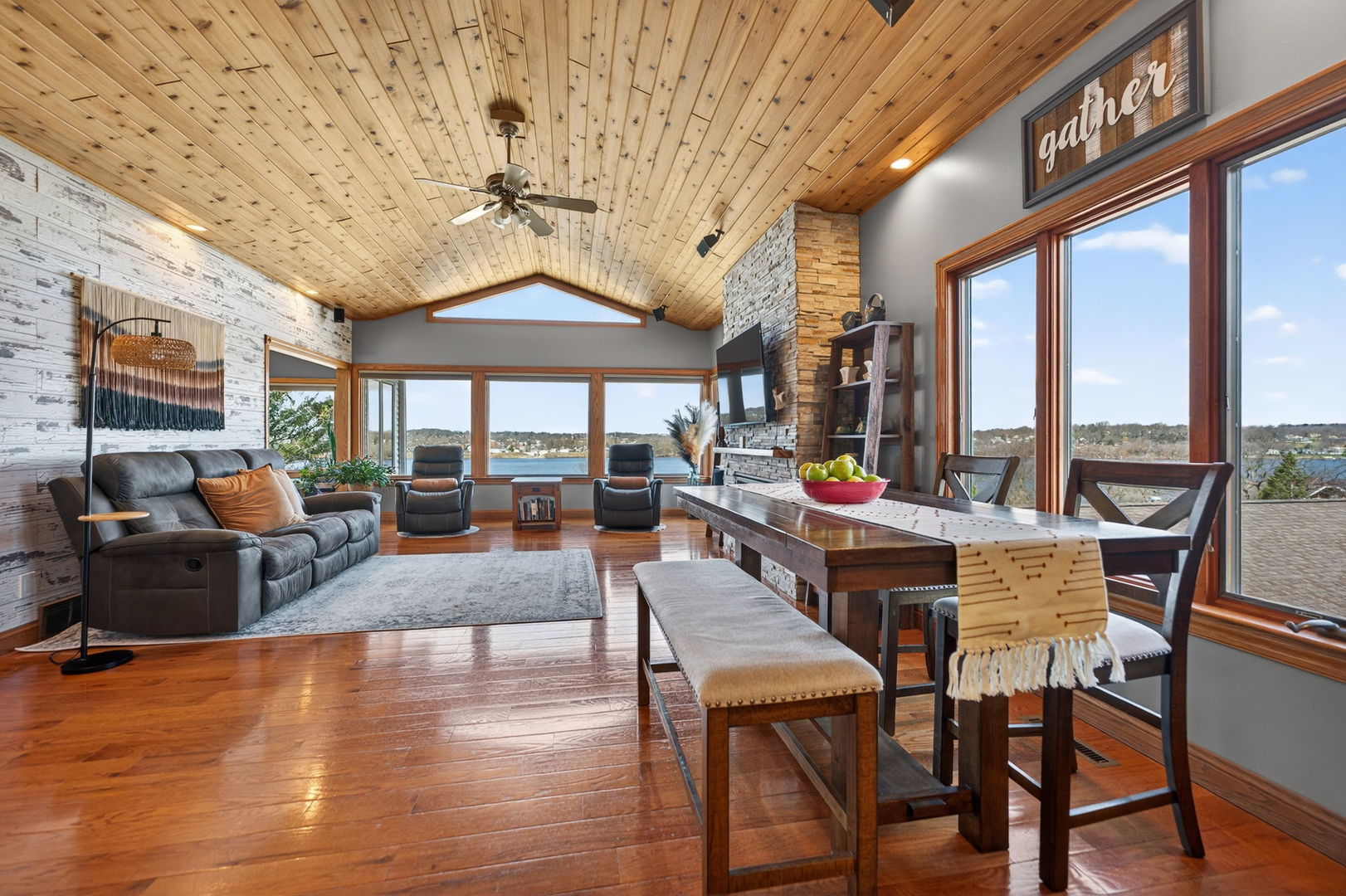 124 5th Street Fulton, IL 61252 - Photo 3 of 45 a view of a dining room with furniture large windows and wooden floor