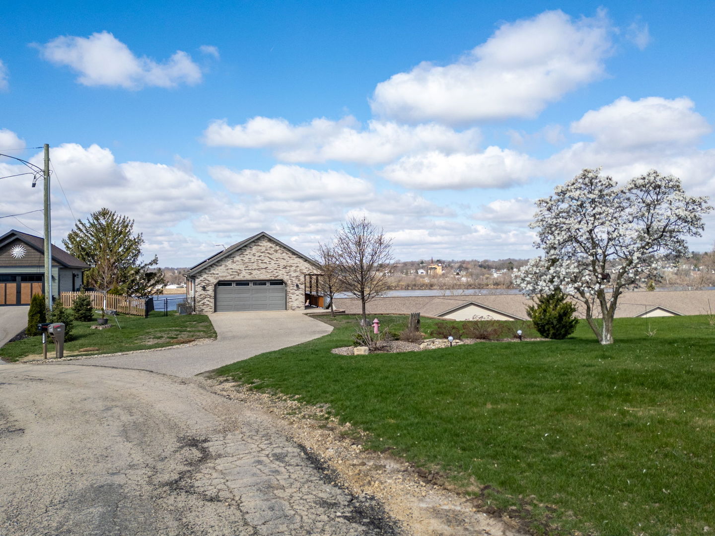 124 5th Street Fulton, IL 61252 - Photo 33 of 45 a view of a house with a big yard plants and large trees