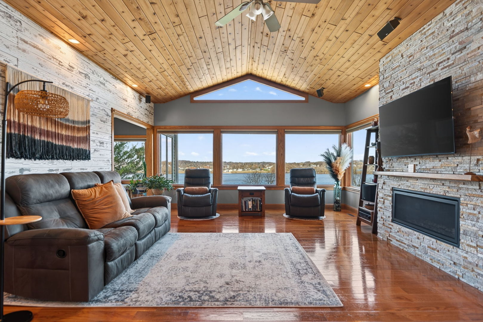 124 5th Street Fulton, IL 61252 - Photo 4 of 45 a living room with furniture and a flat screen tv