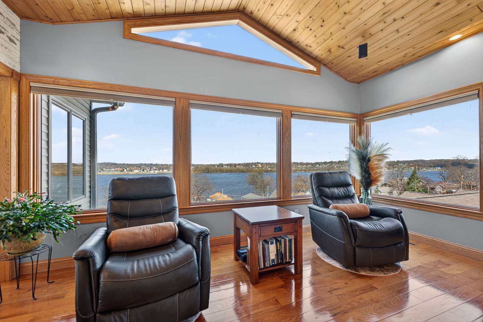 124 5th Street Fulton, IL 61252 - Photo 5 of 45 a living room with furniture and a floor to ceiling window