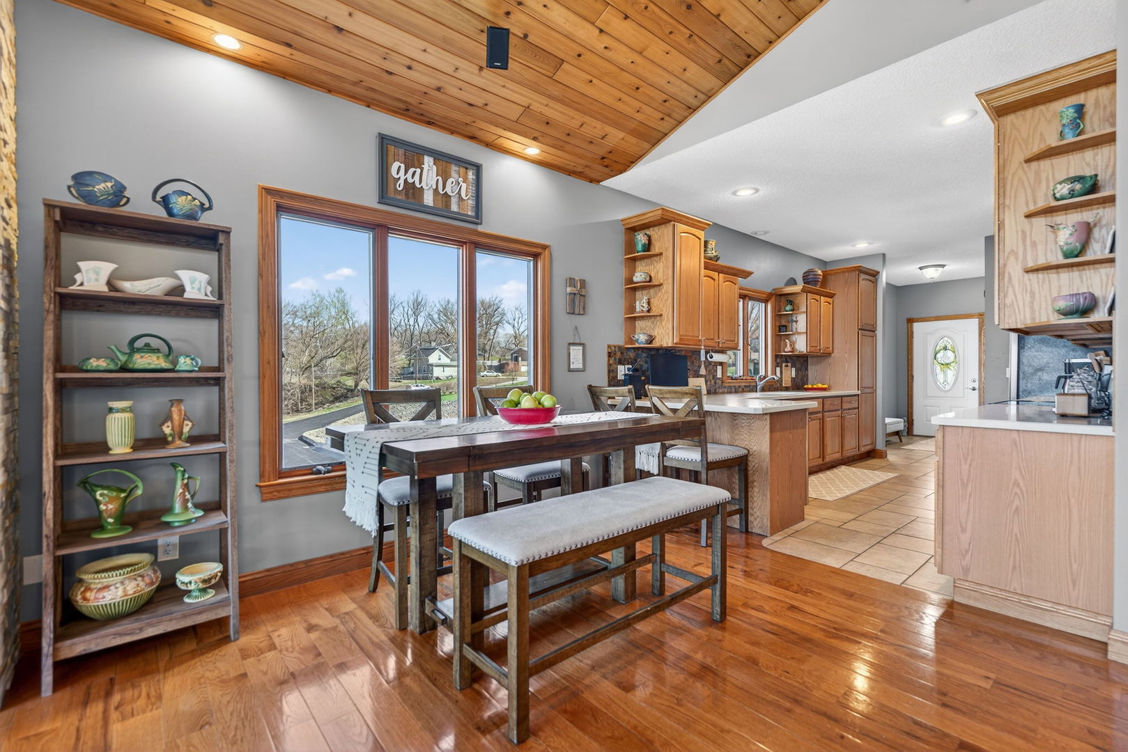 124 5th Street Fulton, IL 61252 - Photo 9 of 45 a living room with furniture a rug and a floor to ceiling window