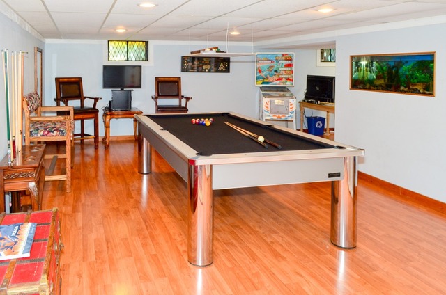 541 Post Road St. Charles, IL 60174 - Photo 11 of 13 a living room with stainless steel appliances furniture a flat screen tv and a table