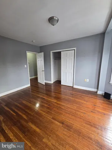 a view of gallery with hardwood