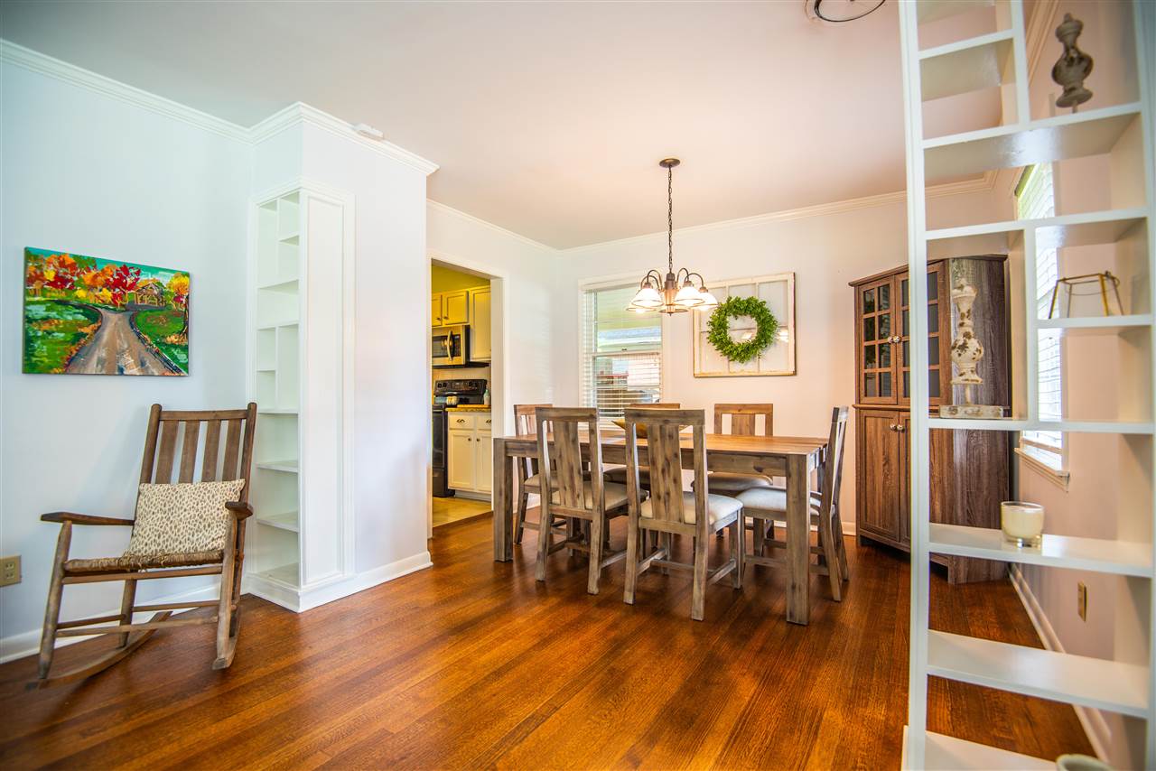 1512 Whitewater Road Memphis, TN 38117 - Photo 8 of 25 a view of a dining room with furniture and wooden floor