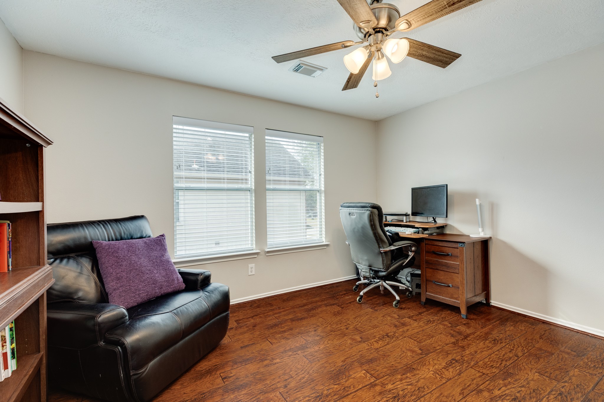 4113 Merlet Drive Pearland, TX 77584 - Photo 26 of 36 The flex room is spacious, featuring two large windows that allow ample natural light to fill the space.