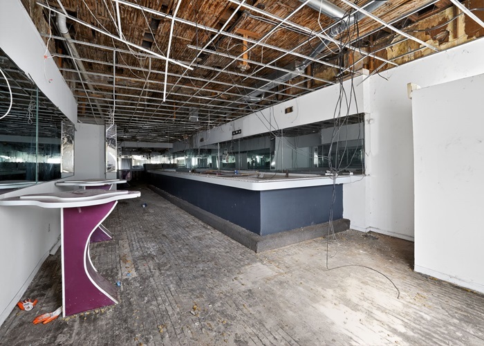 1114 West 51st Street Chicago, IL 60609 - Photo 14 of 20 a room with utility room and wooden floor