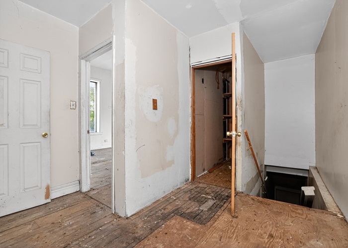 1114 West 51st Street Chicago, IL 60609 - Photo 18 of 20 a view of entryway with wooden floor and staircase