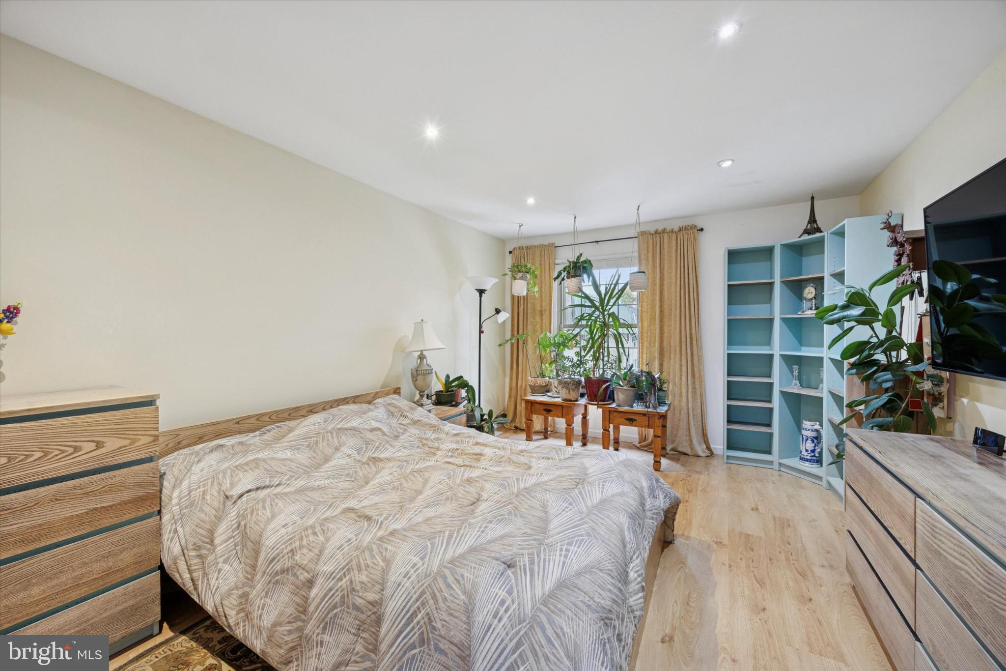 441 Tomlinson Road, Unit F6 Philadelphia, PA 19116 - Photo 2 of 14 Serene bedroom with natural light and greenery.