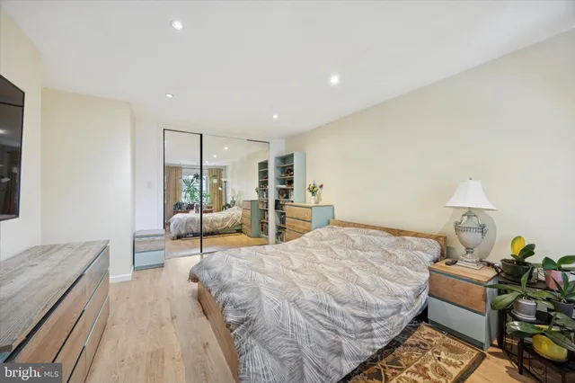 a bed room with a bed and a couch