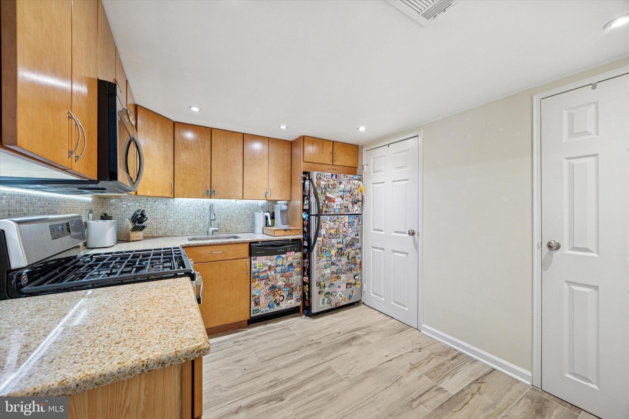 441 Tomlinson Road, Unit F6 Philadelphia, PA 19116 - Photo 9 of 14 Modern kitchen with sleek cabinetry.