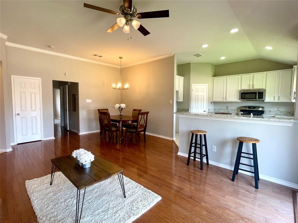 1988 Signal Ridge Place Rockwall, TX 75032 - Photo 4 of 17 Dining area with new light fixture