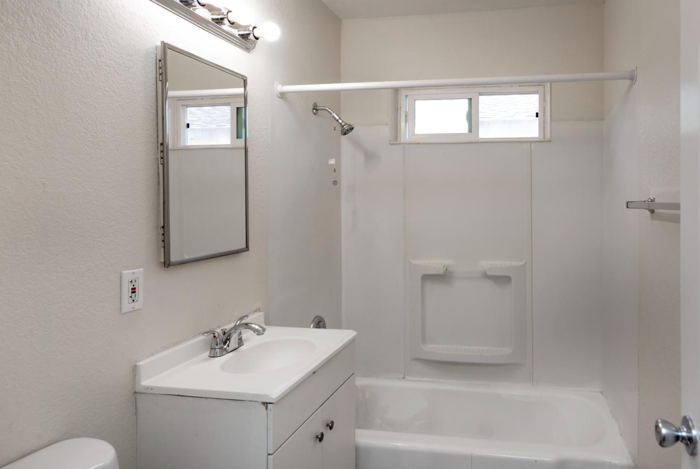 2136 Main Street Santa Clara, CA 95050 - Photo 4 of 10 a bathroom with a sink toilet and shower