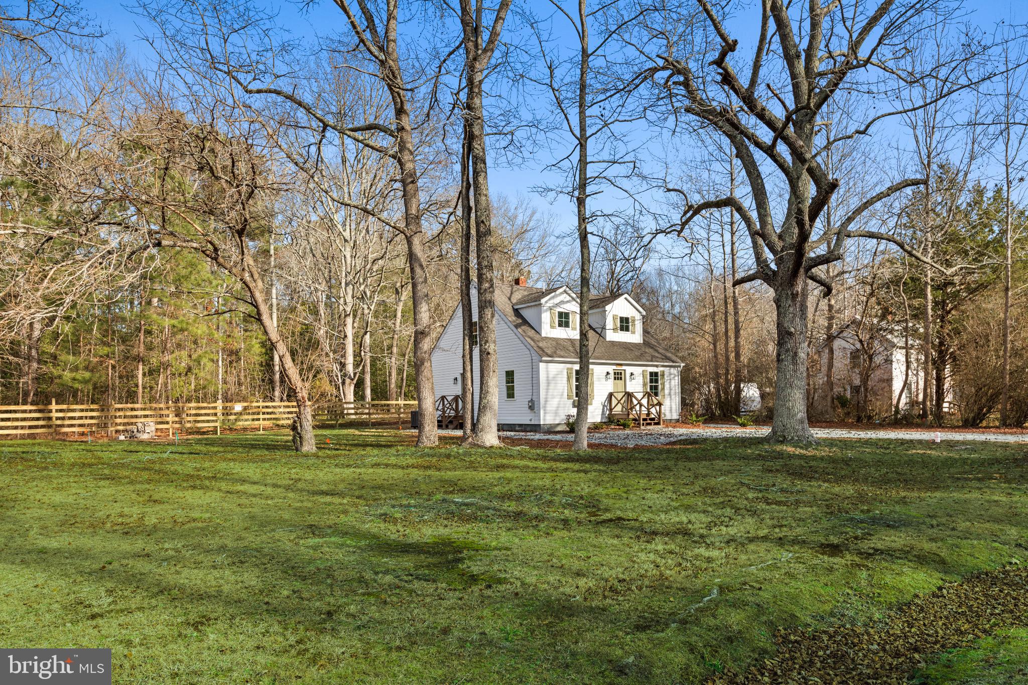 22202 Wetipquin Road Quantico, MD 21856 - Photo 1 of 28 Charming home nestled among serene trees.