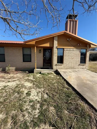 a view of a house with a patio