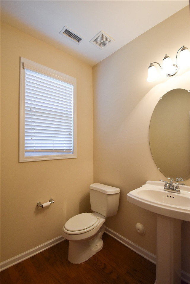 2712 Cloud Mist Circle Raleigh, NC 27614 - Photo 13 of 30 The main level half bath has a pedestal sink. Half Bath