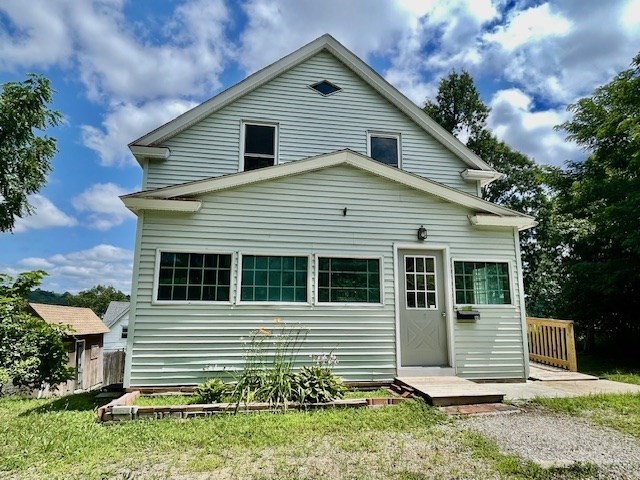 44 Boardman Street Worcester, MA 01606 - Photo 21 of 29 a front view of a house with a yard