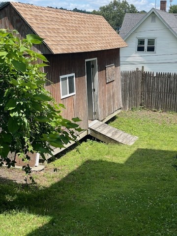 44 Boardman Street Worcester, MA 01606 - Photo 26 of 29 a backyard of a house with lots of green space