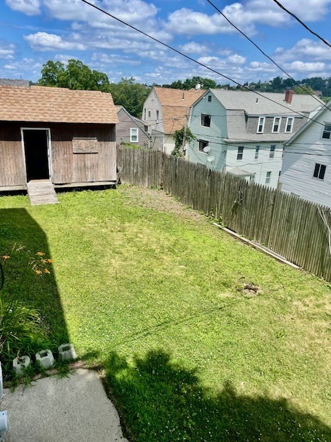 44 Boardman Street Worcester, MA 01606 - Photo 27 of 29 a front view of house with a garden