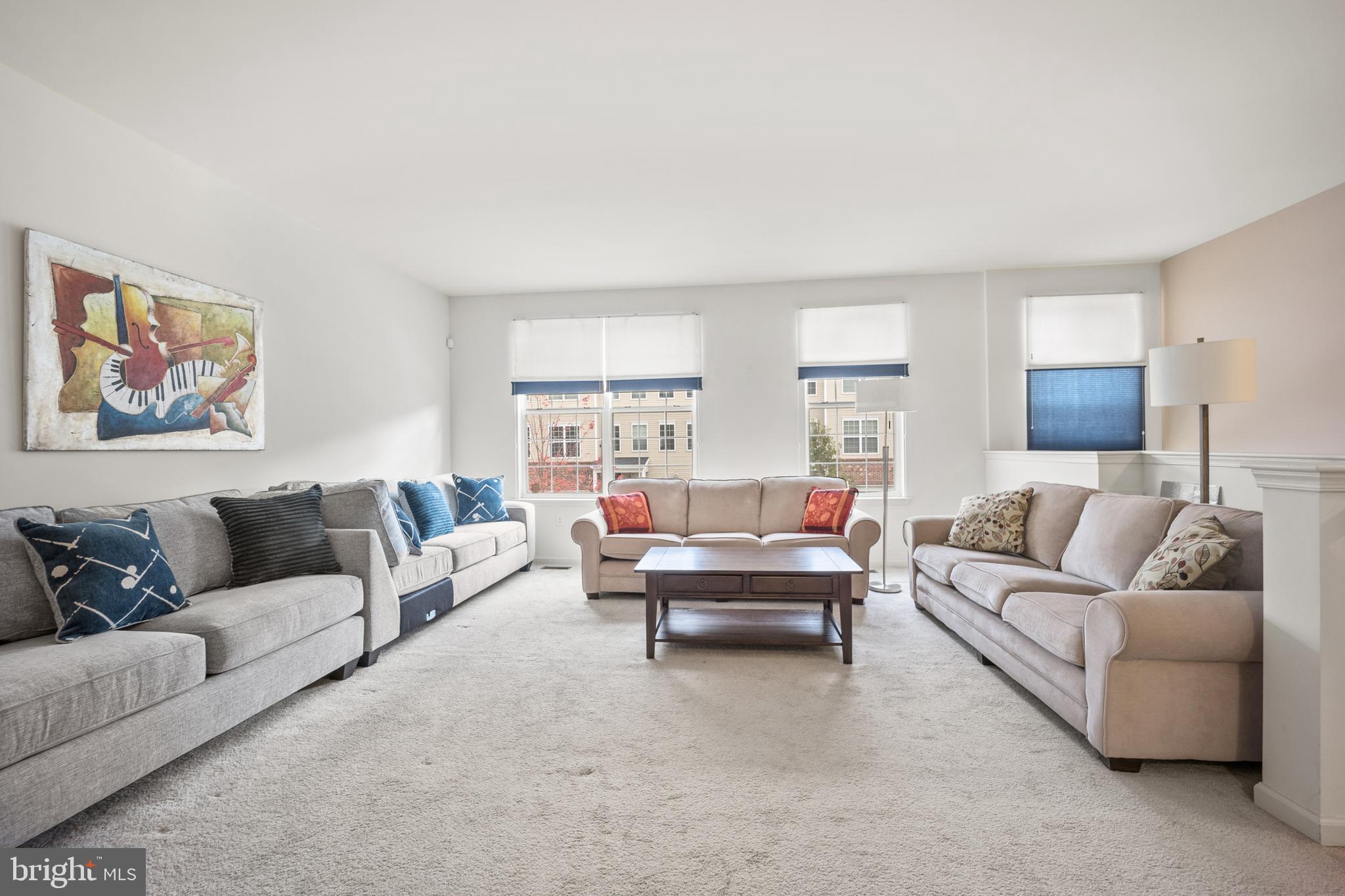 151 Creekside Way Burlington, NJ 08016 - Photo 3 of 35 a living room with furniture and a couch
