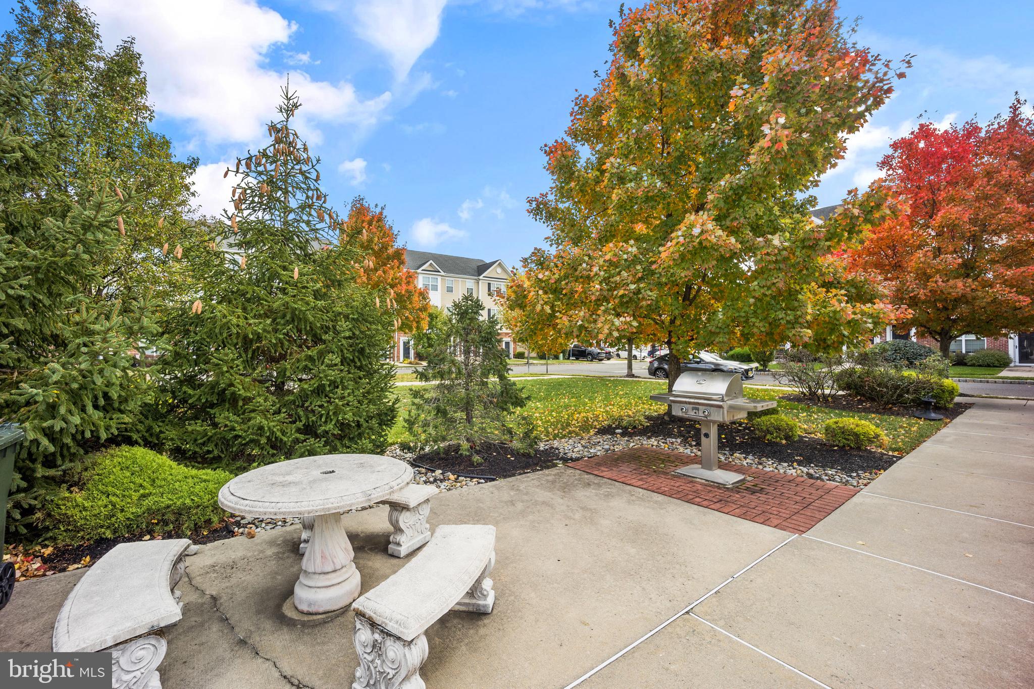 151 Creekside Way Burlington, NJ 08016 - Photo 31 of 35 a view of a backyard with sitting area