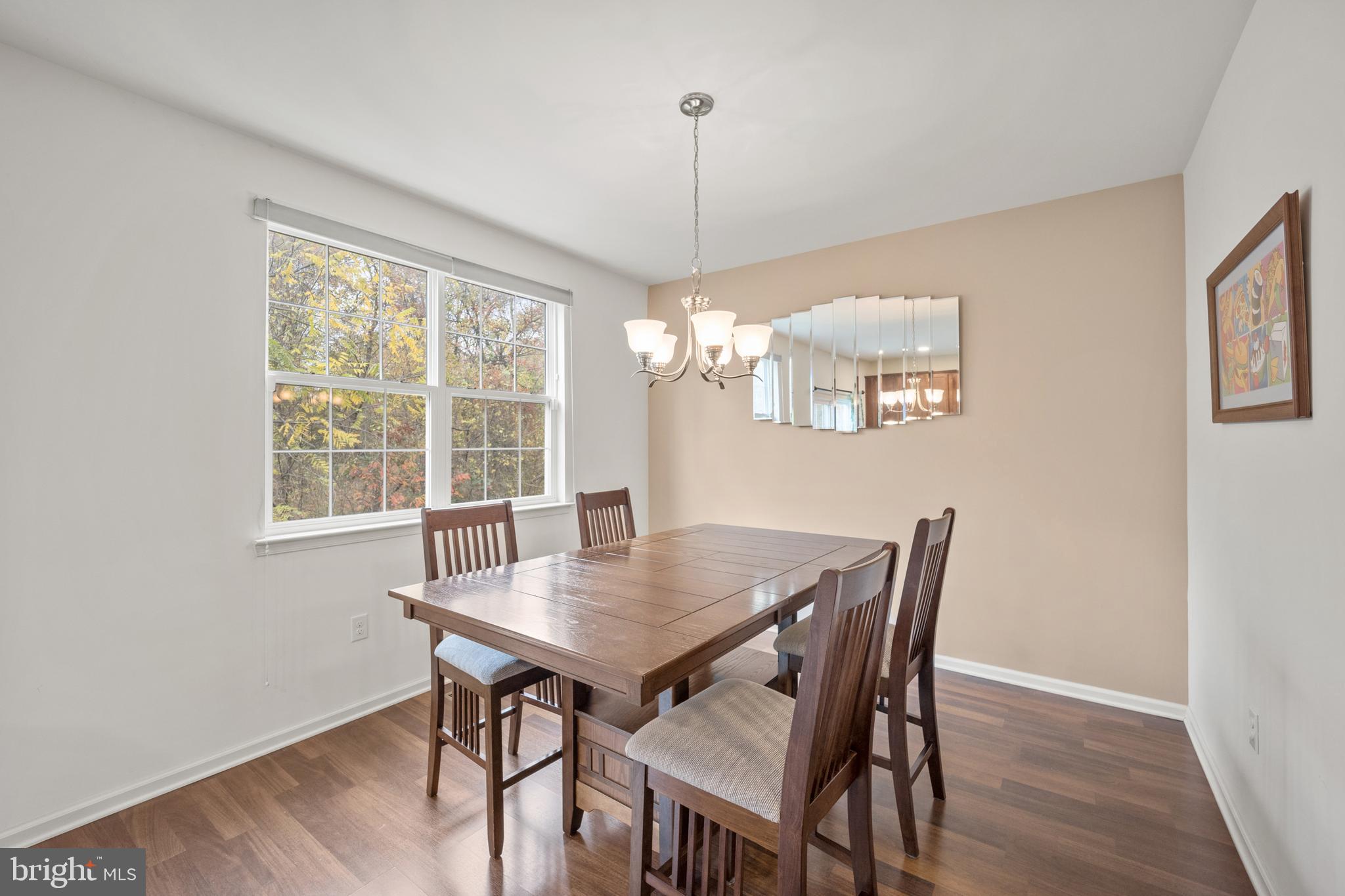 151 Creekside Way Burlington, NJ 08016 - Photo 6 of 35 a view of a dining room with furniture window and wooden floor