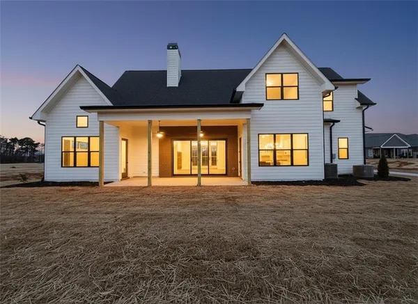 a view of a porch with a big yard