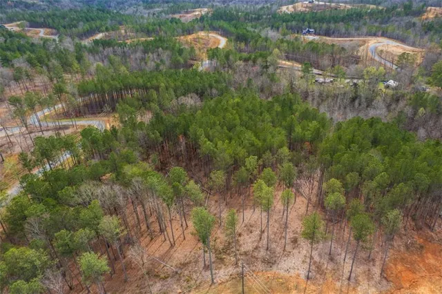 a view of lake with a city
