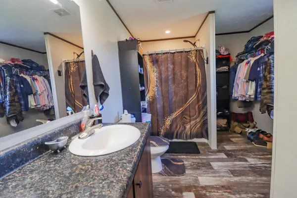 a bathroom with sink and a mirror