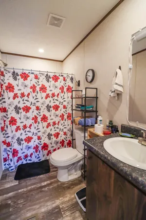 a room with furniture a book shelf and a bookshelf