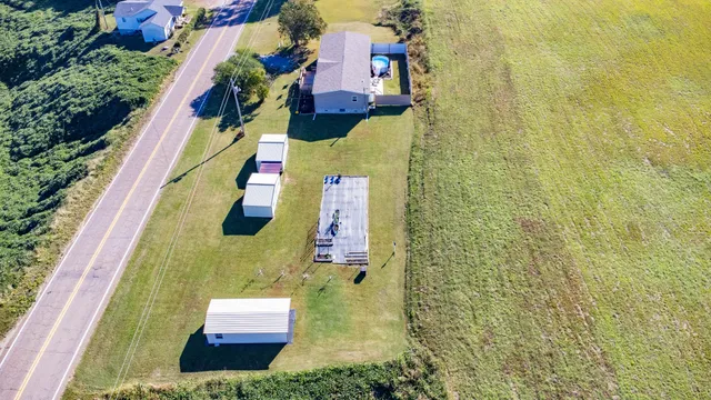 a view of swimming pool with a yard
